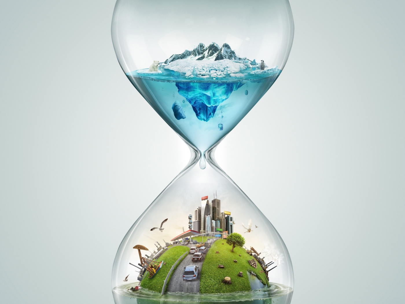 Креативные песочные часы на сером фоне