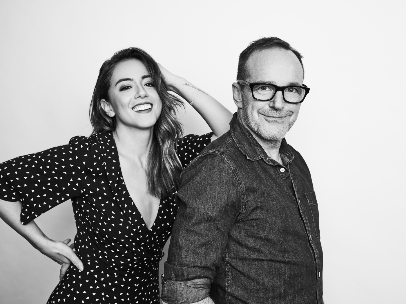 Actress Chloe Bennet and actor Clark Gregg black and white photo