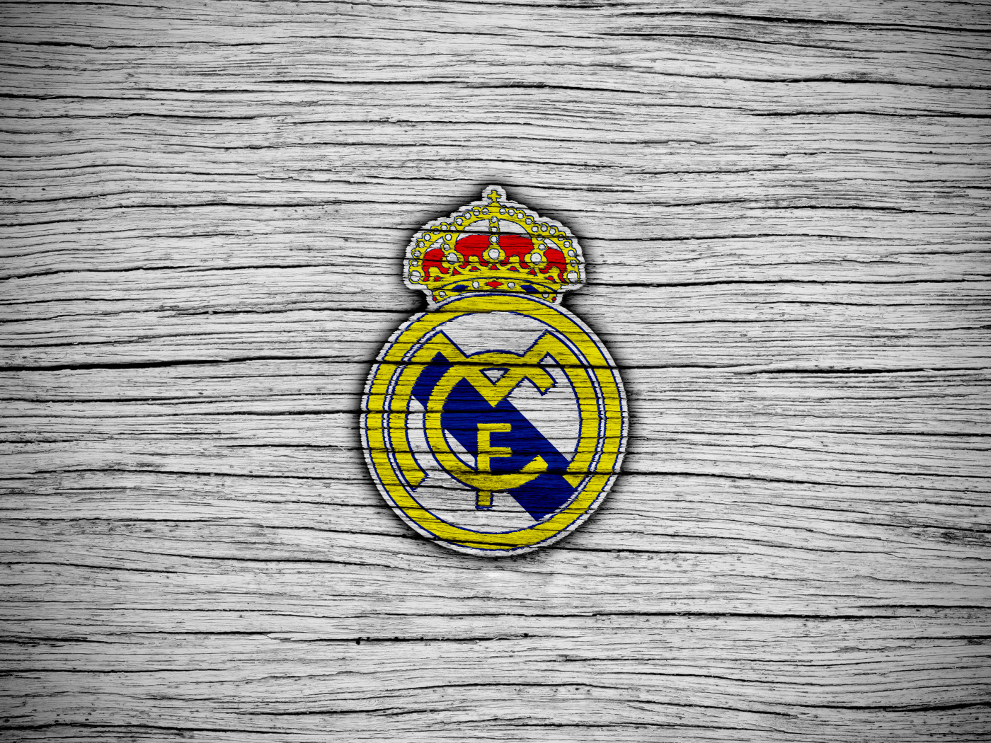 The logo of the football club Real Madrid on a gray background