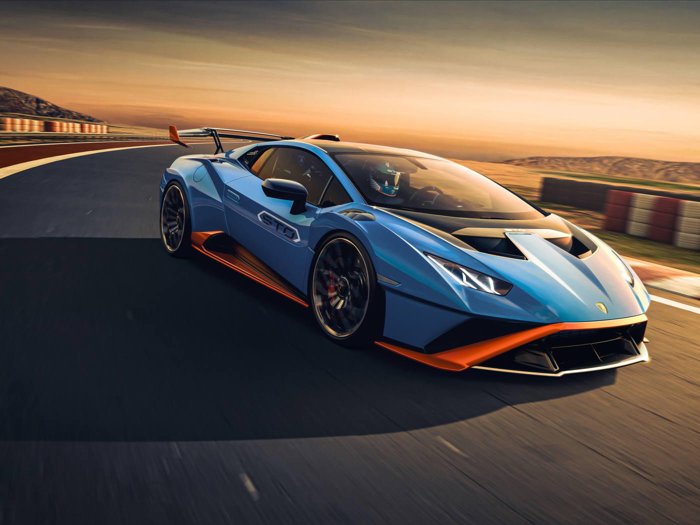 Быстрый Lamborghini Huracán STO 2021 года на гонках