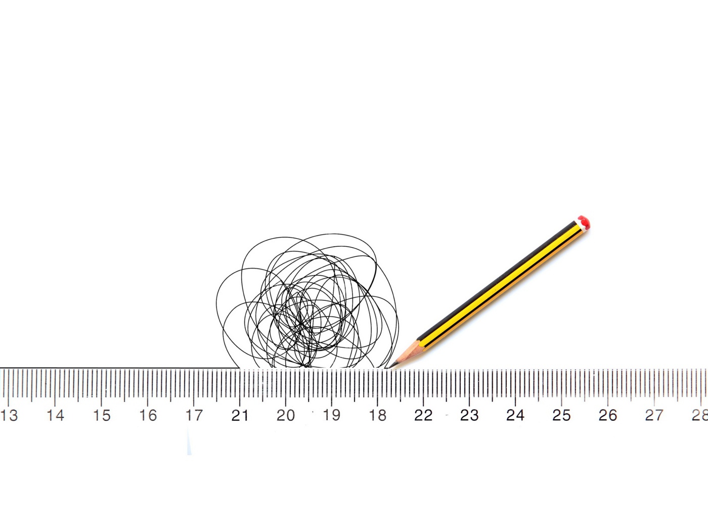 Pencil draw on white paper under the ruler