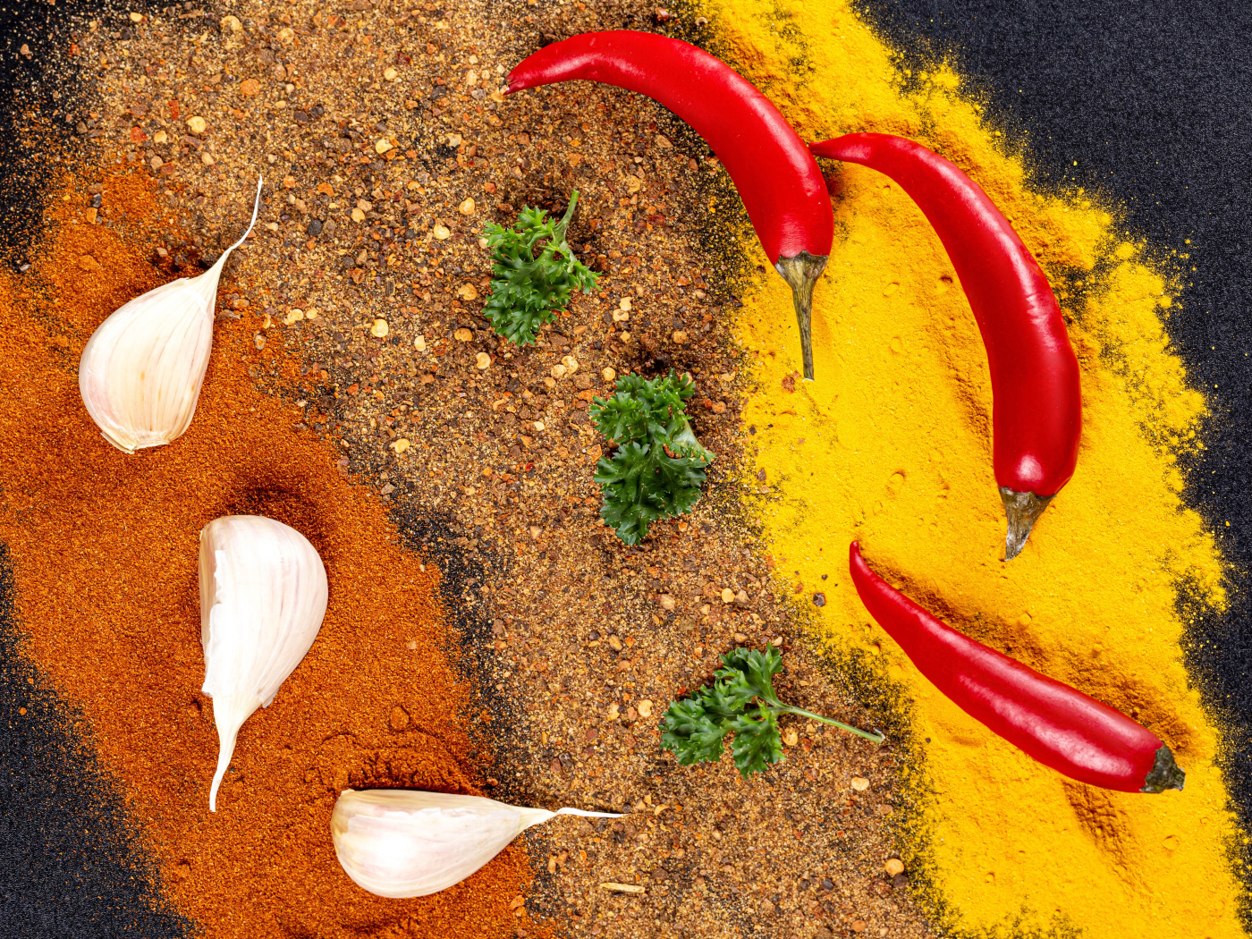 Hot spices on the table with pepper and garlic