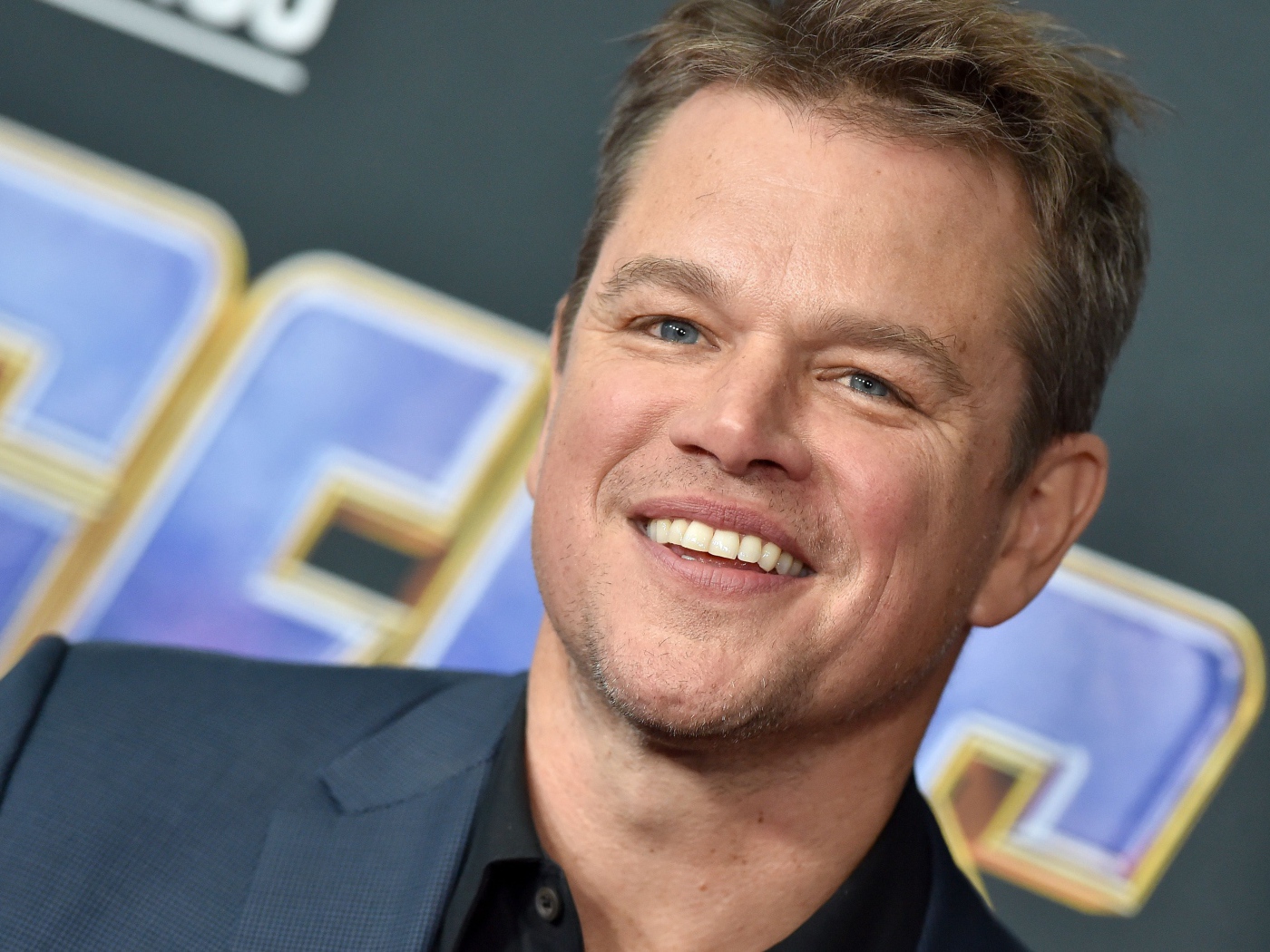 Голубоглазый актер Мэтт Деймон с улыбкой на лице