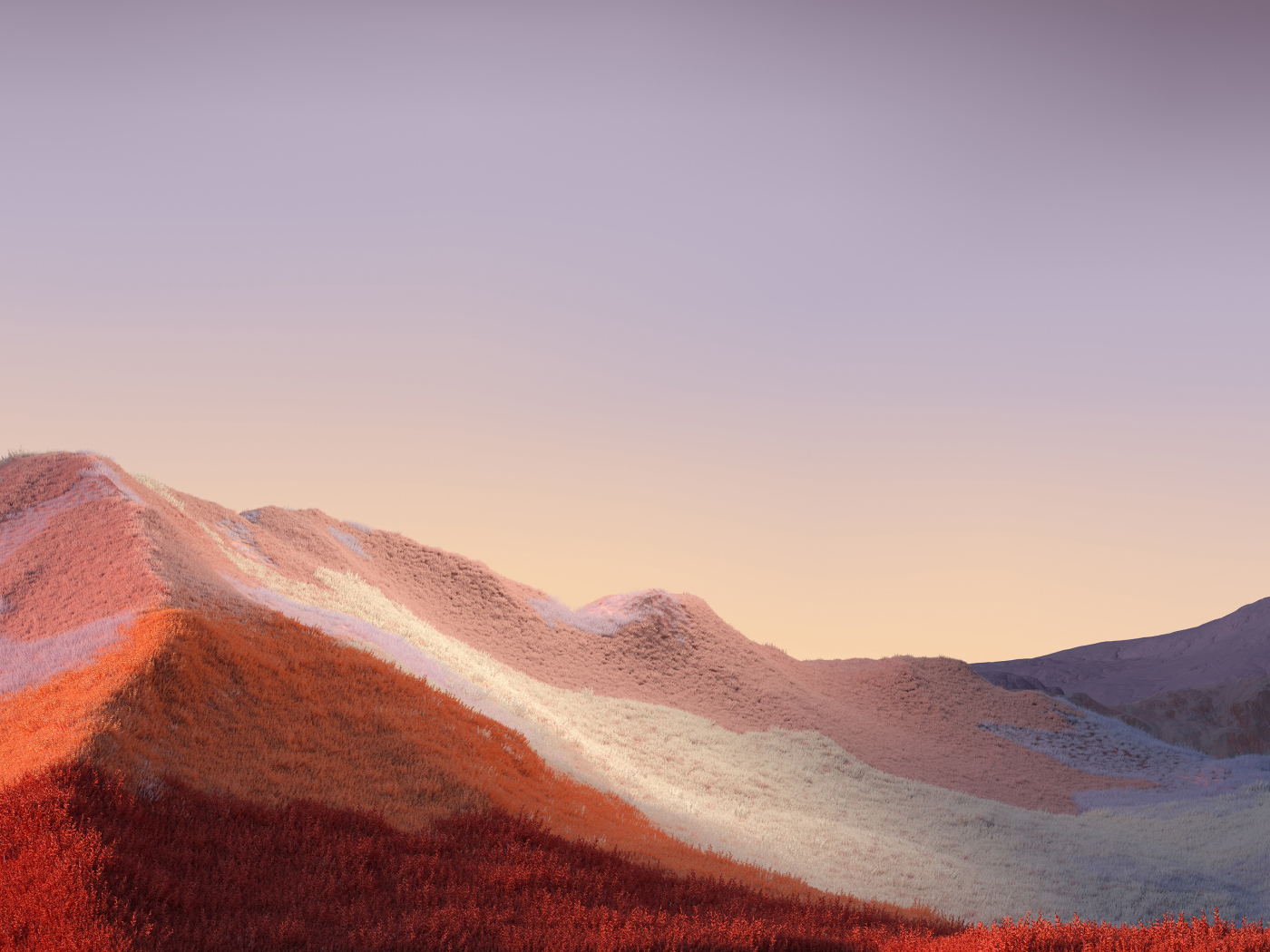 Покрытые травой горы на фоне неба