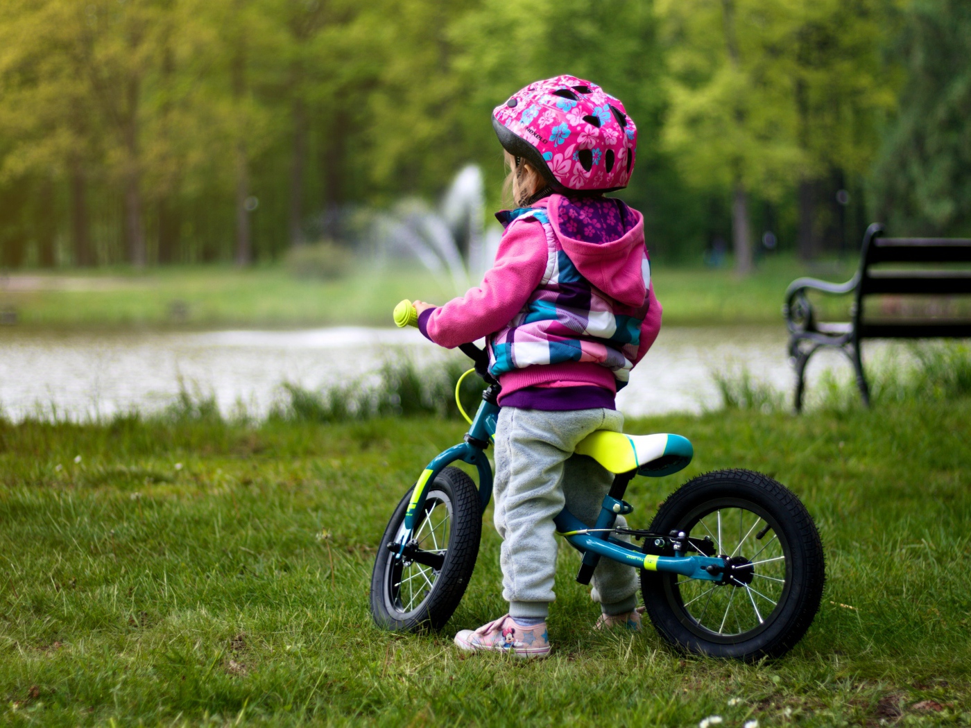 Little girl on a bicycle in the park