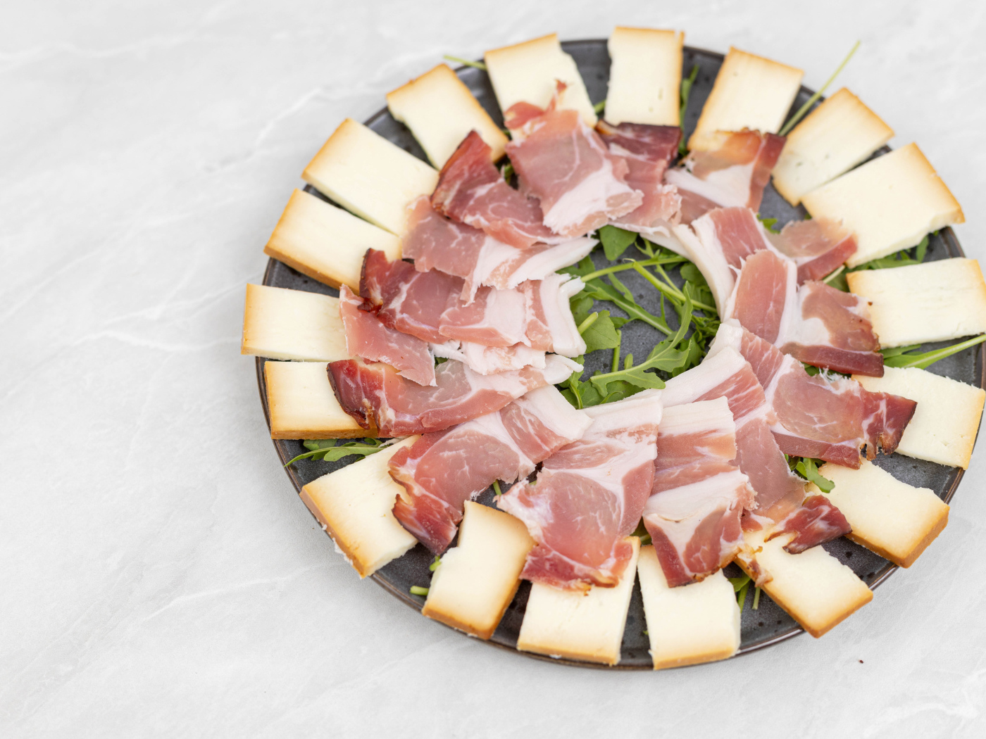 Ham with cheese on a large plate