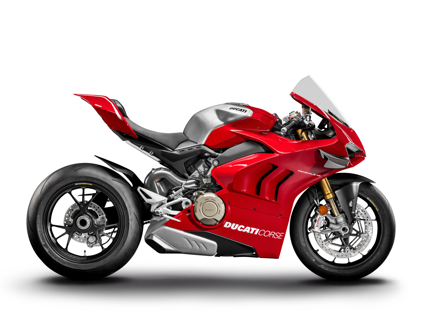 Red motorcycle Ducati Panigale V4 on a white background