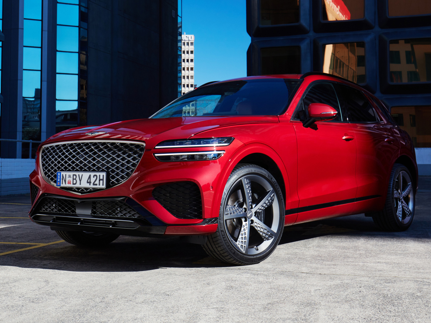 Красный блестящий Genesis GV70 2.5T AWD 2023