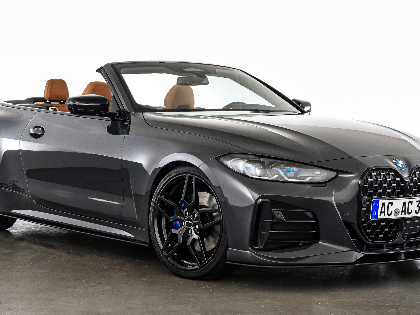 Серебристый кабриолет BMW 4 Series Cabrio 2021 года