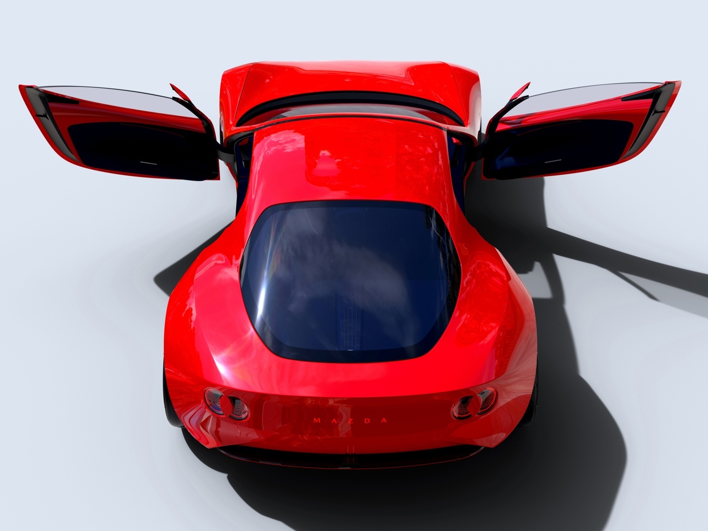 Вид сзади на красный автомобиль концепт Mazda Iconic SP