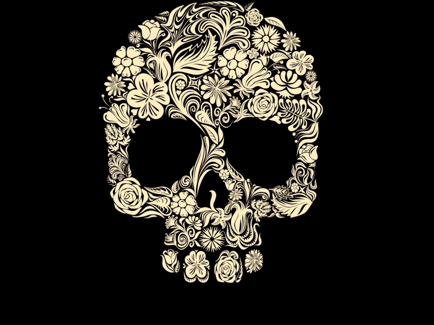 Череп из цветов на черном фоне