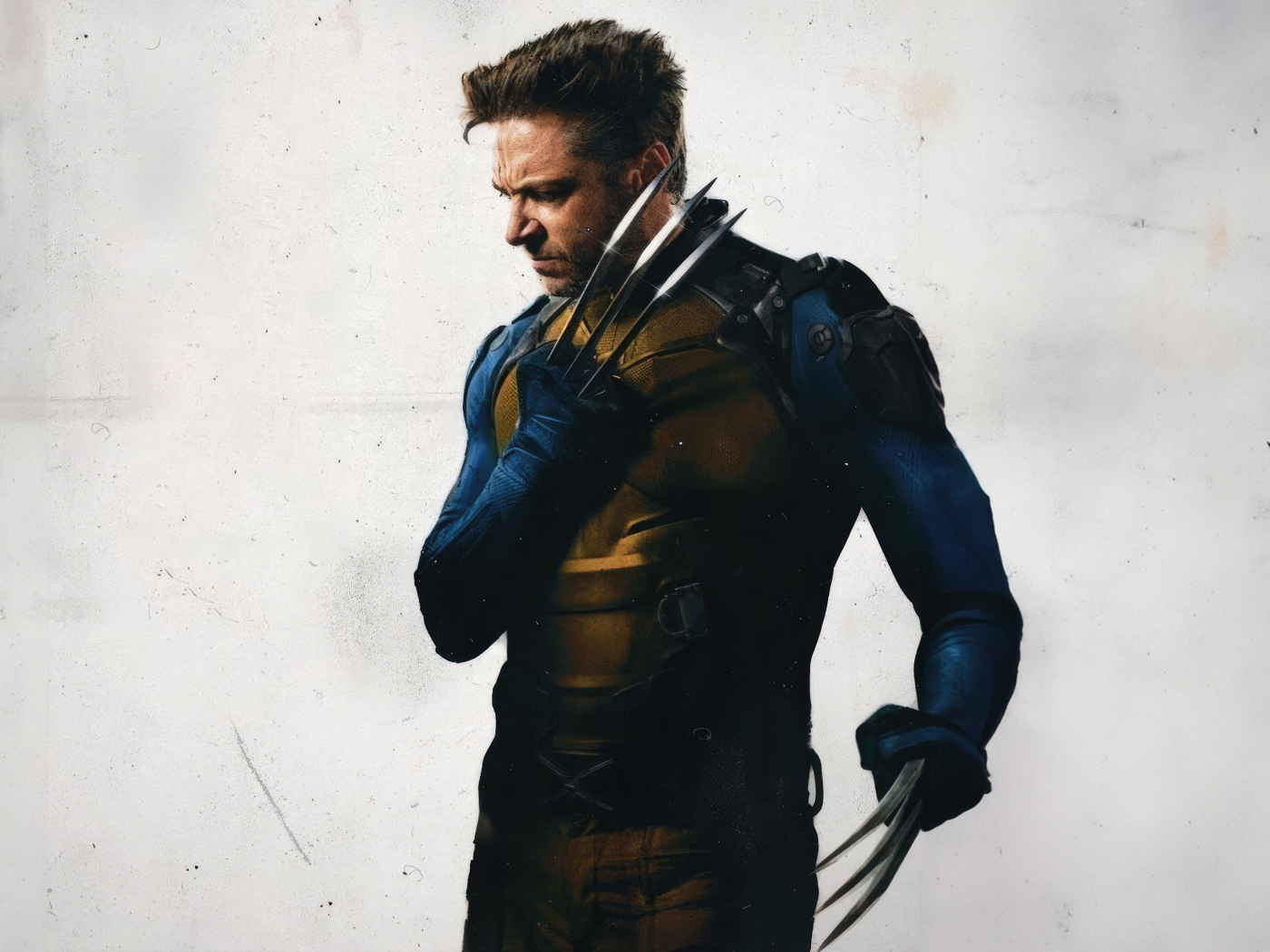 Супергерой Росомаха на сером фоне