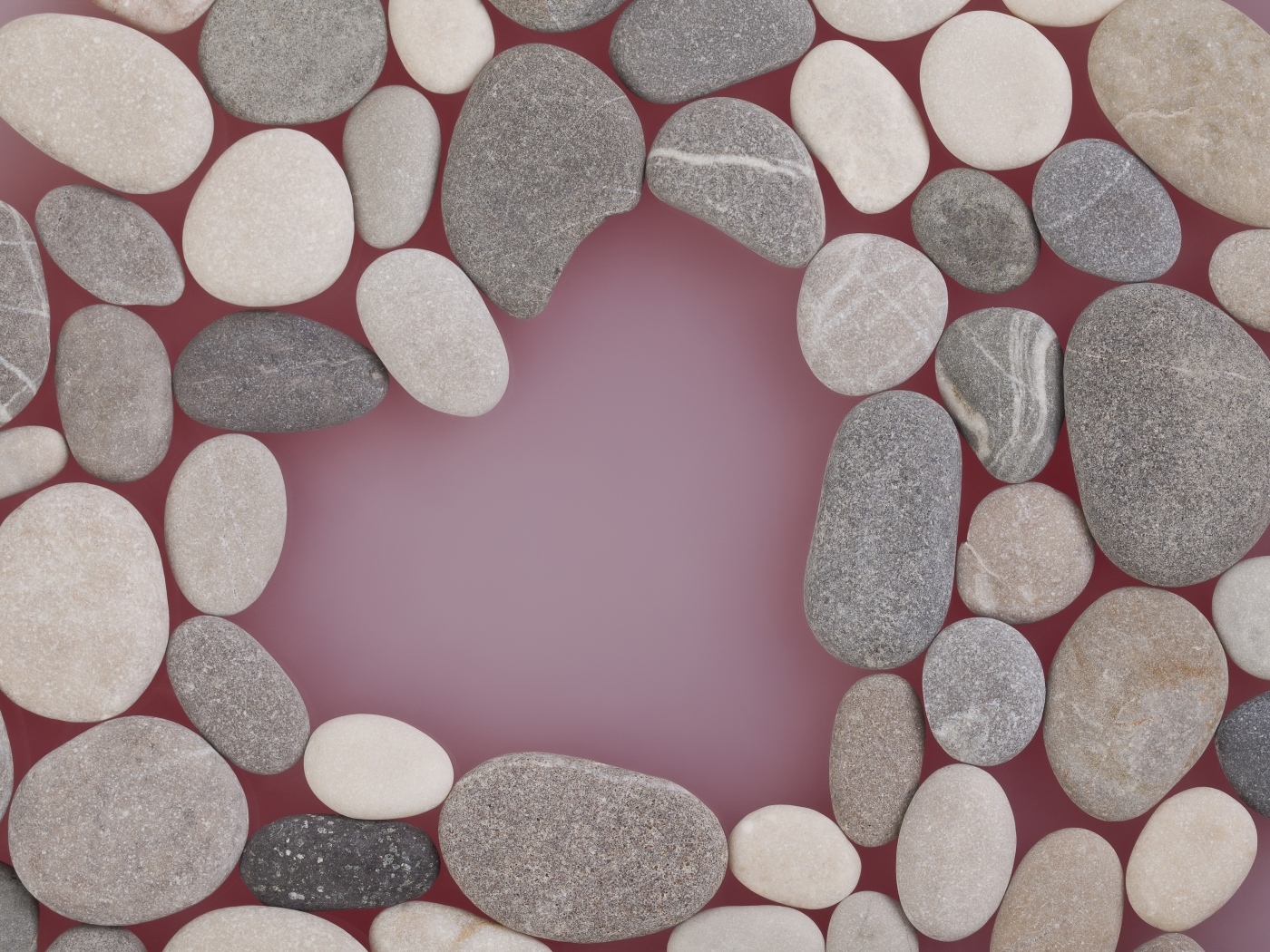 Много камней на розовом фоне