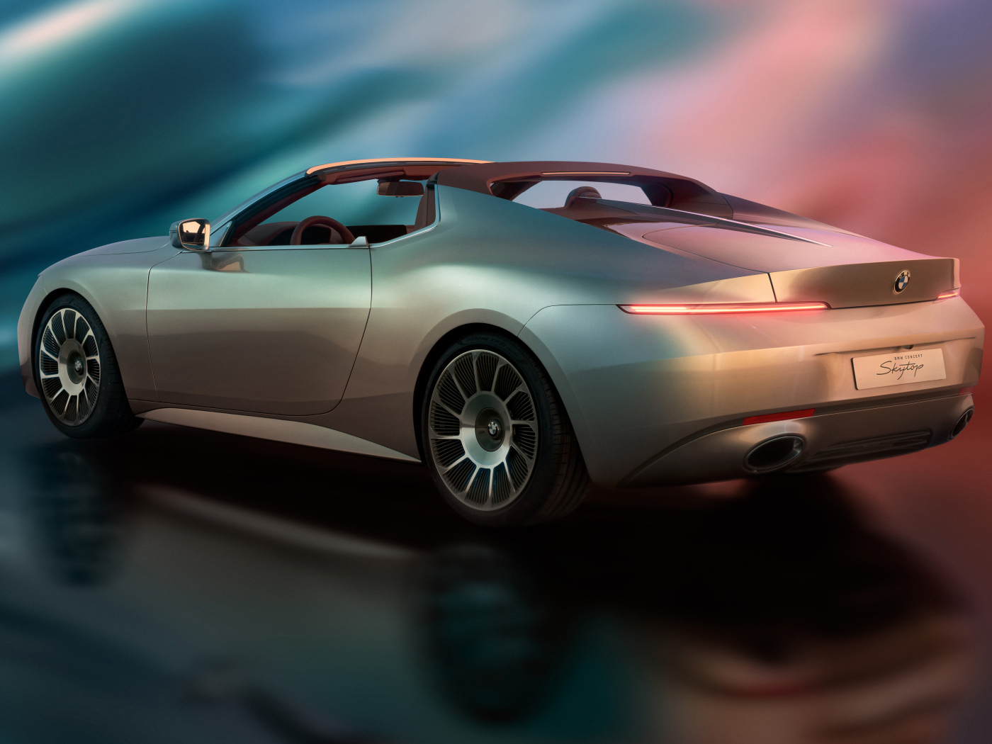 Вид сбоку на автомобиль  BMW Concept Skytop 2024