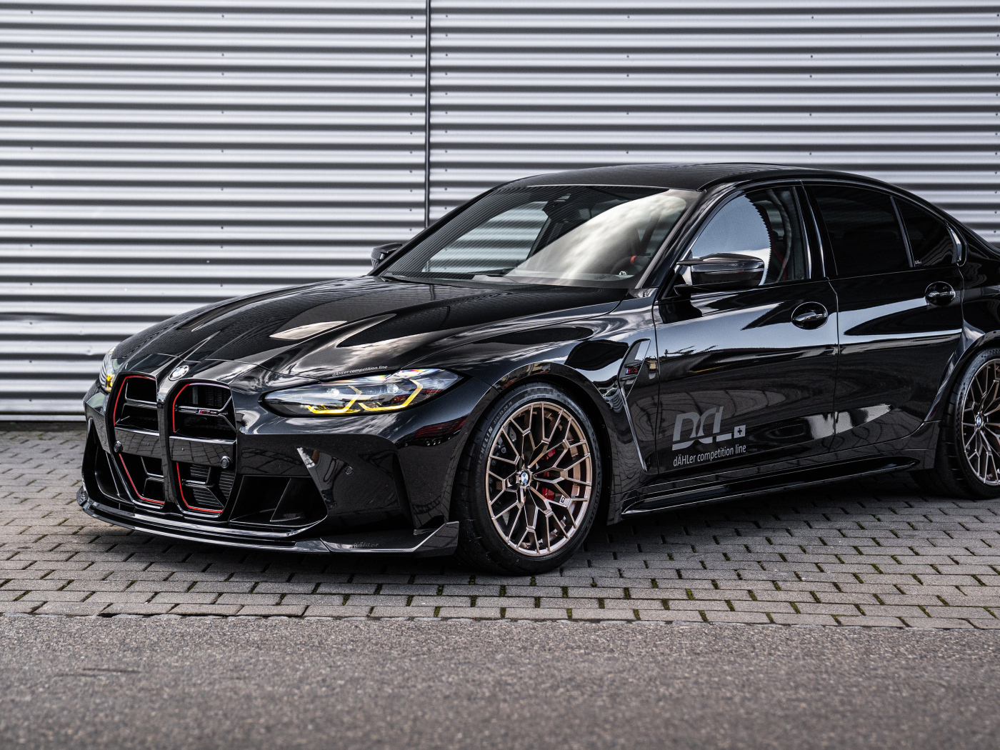 Черный автомобиль Dahler BMW M3 CS