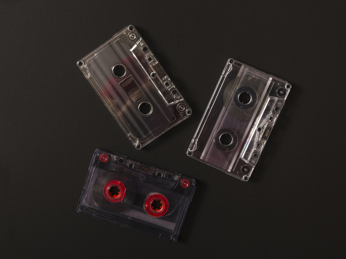Три кассеты на черном фоне