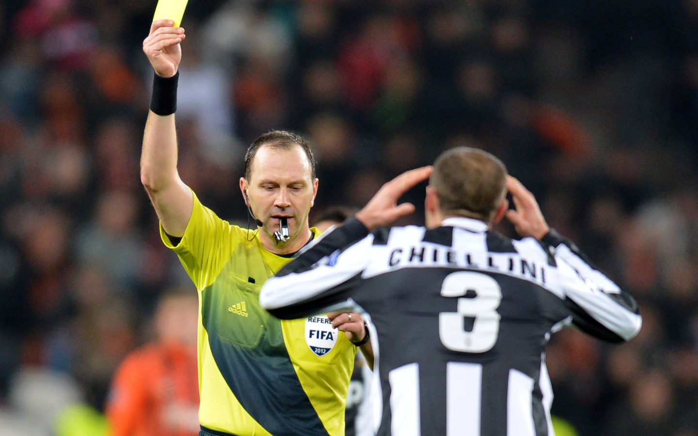 The halfback of Juventus Giorgio Chiellini gets a yellow card