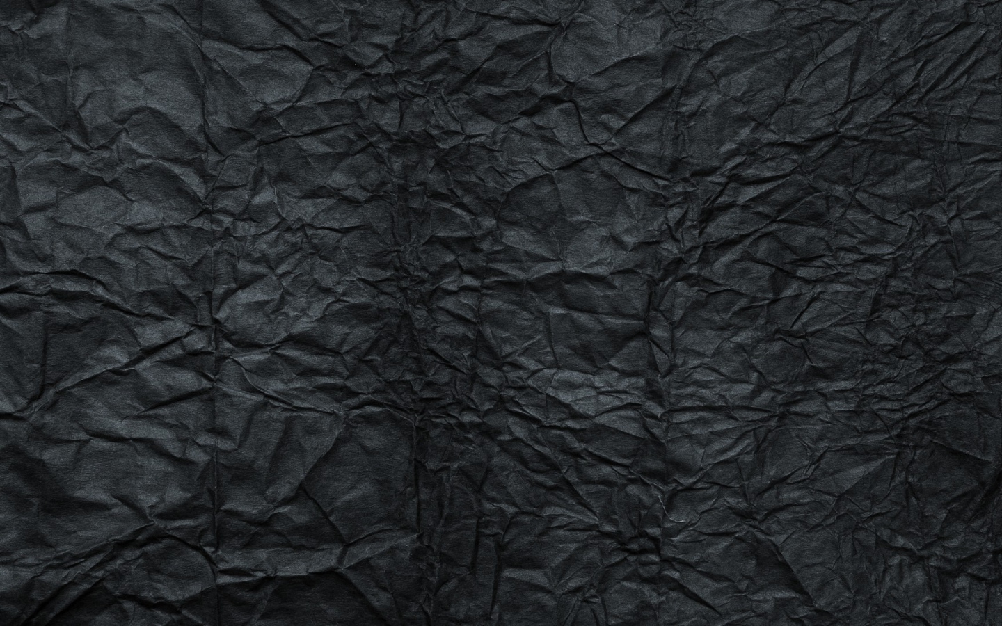 Мятая черная бумага