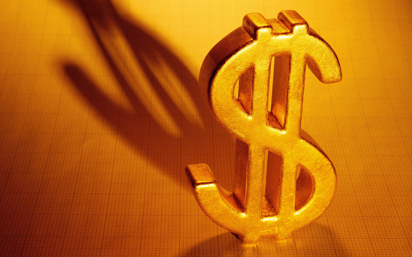 Золотой знак доллара