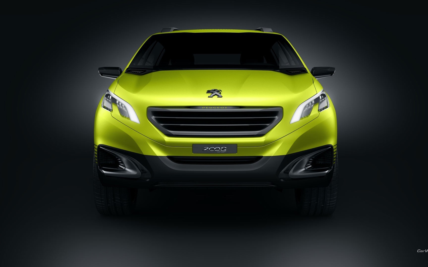 Желтый Peugeot 2008 на сером фоне
