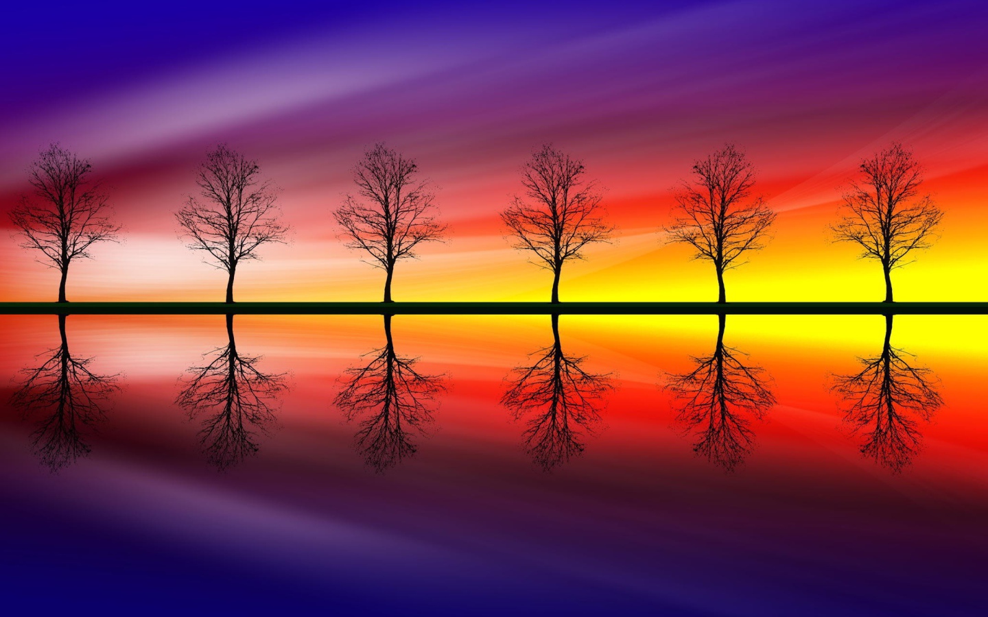 Голые деревья на фоне красочного заката