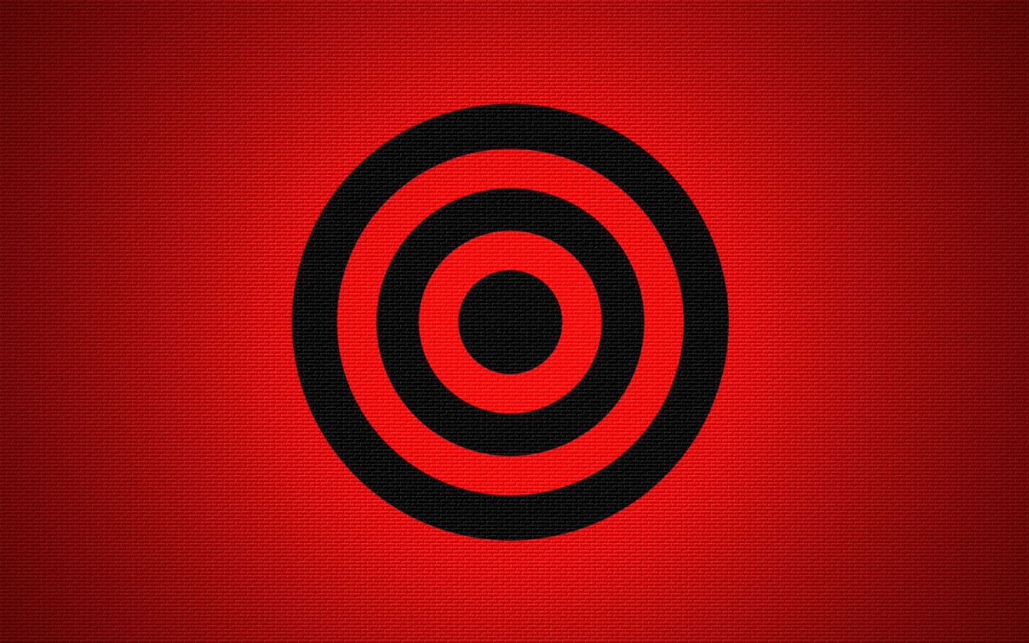 Черная мишень на красном фоне
