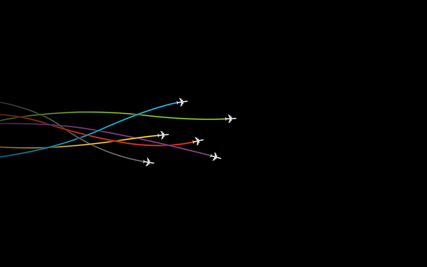 Самолеты оставляют следы на черном фоне