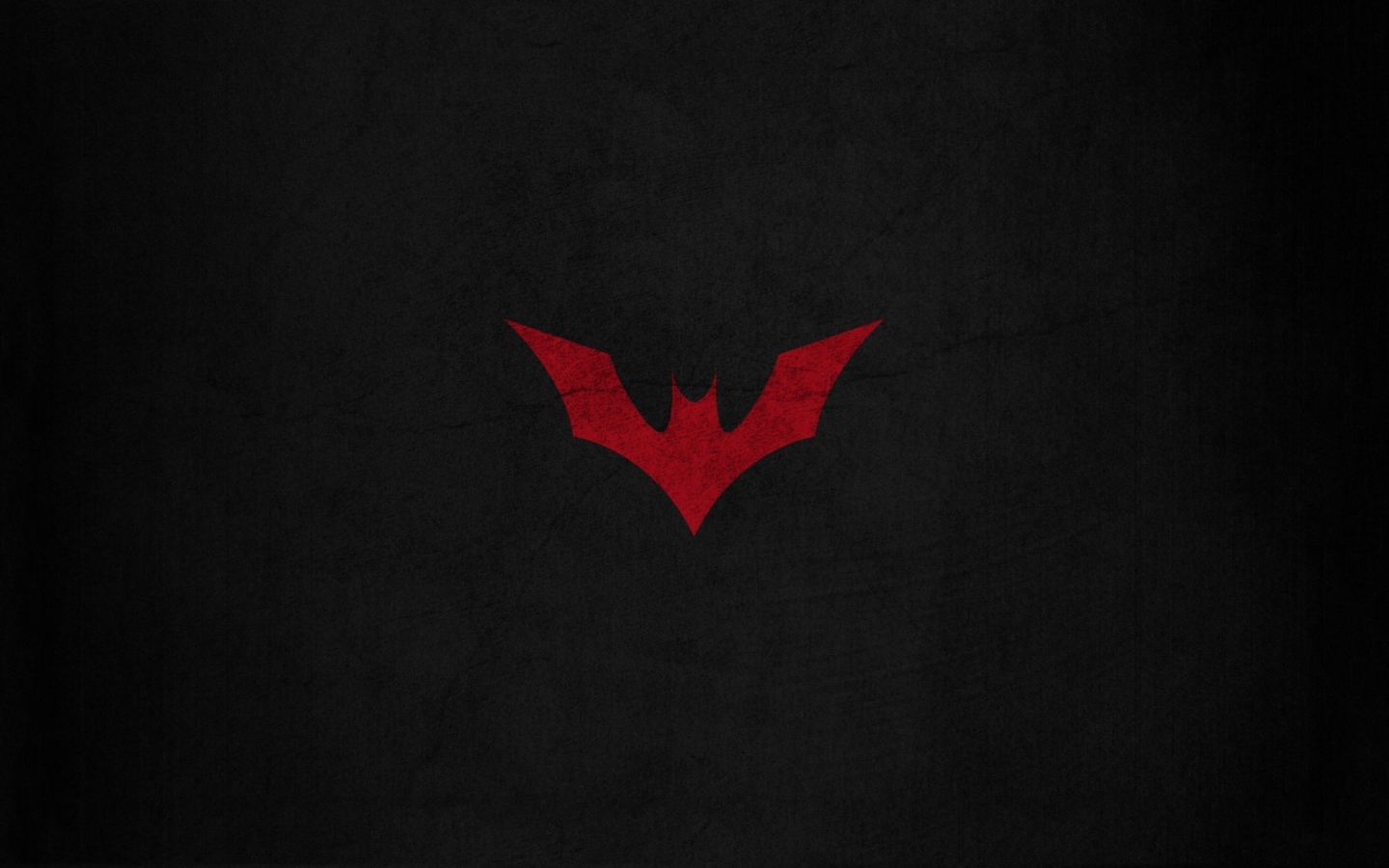 Красная летучая мышь на черном фоне