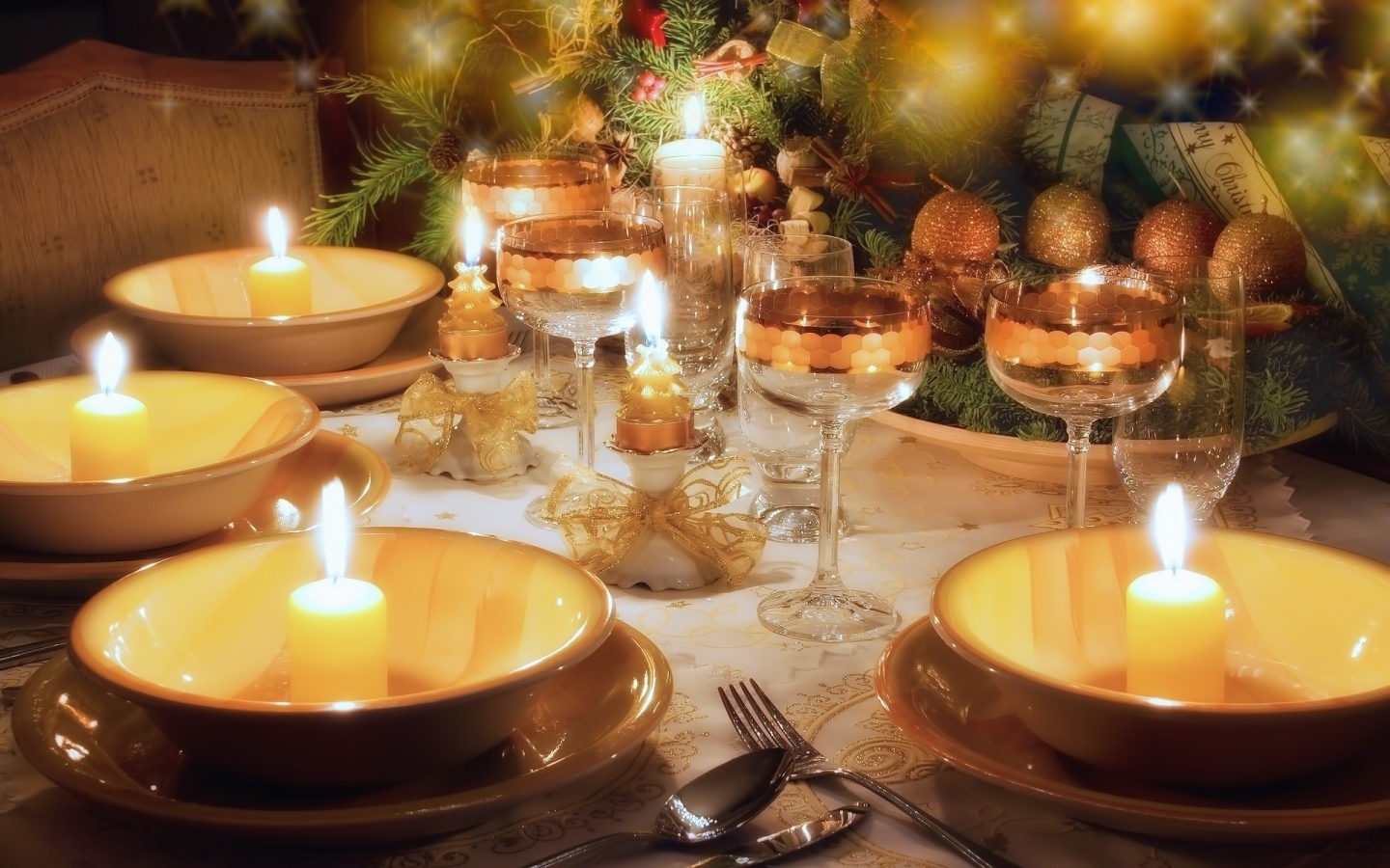 Candles in the dishes on the holiday table
