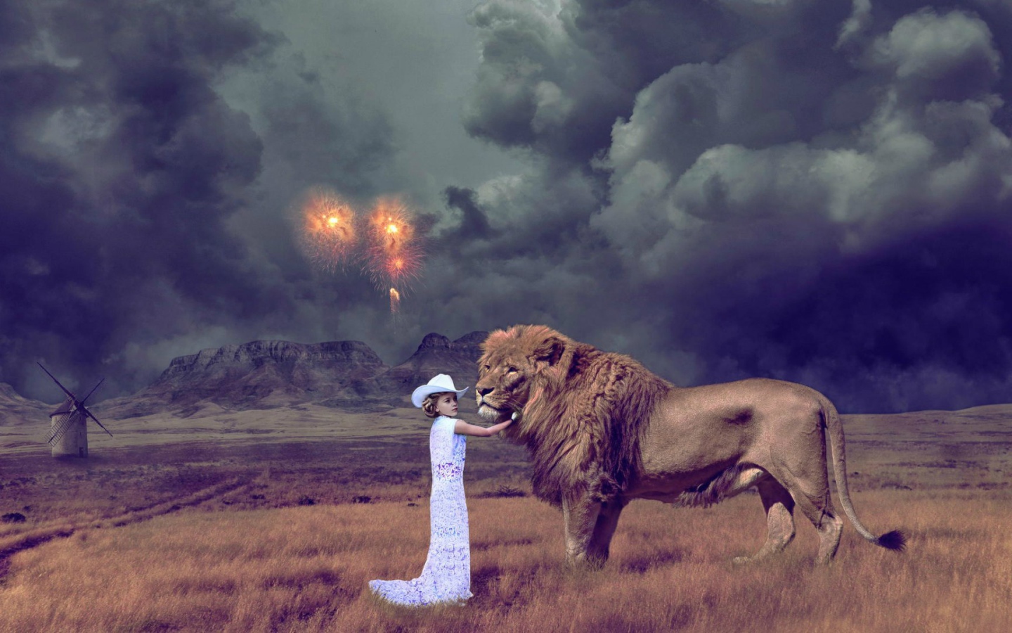 Девочка играет со львом