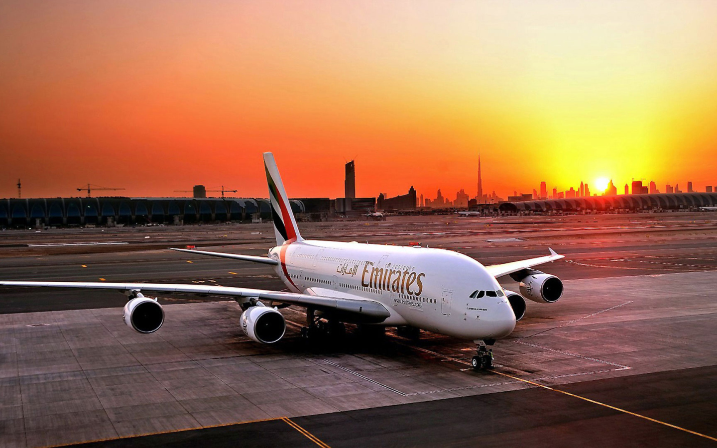 Airbus A380 Emirates airline on the sunset background