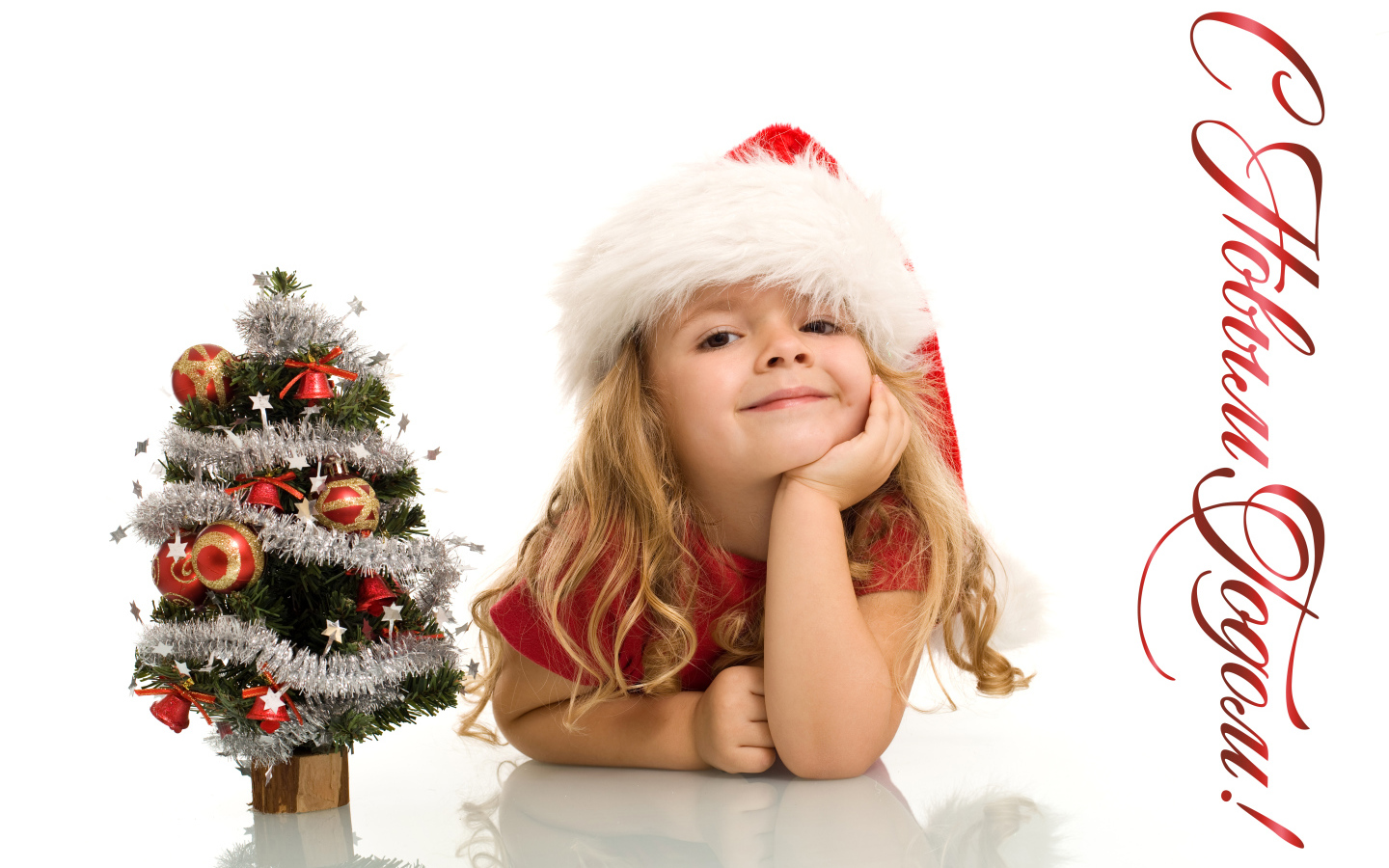 Little girl in a New Year costume on a white background