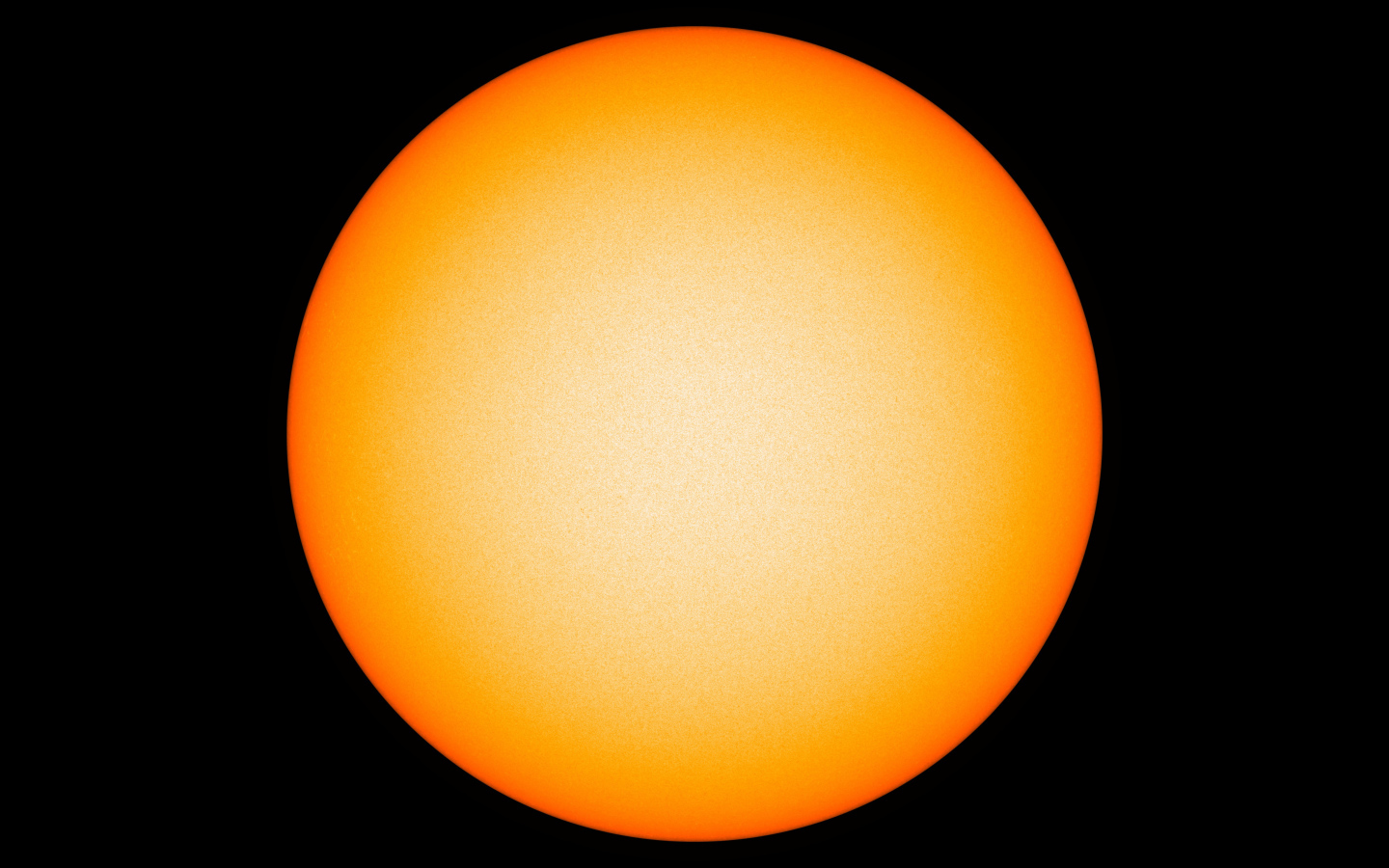 Яркое желтое солнце на черном фоне