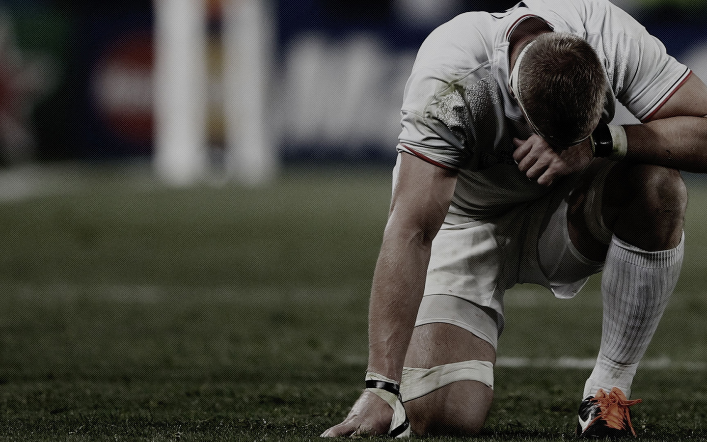 Спортсмен регбист на поле 