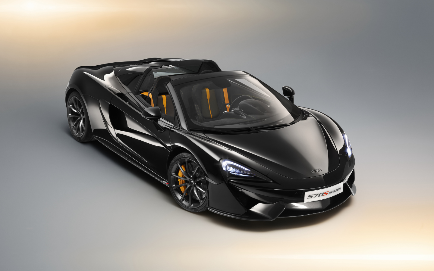 Черный автомобиль кабриолет McLaren 570S Spider, 2018