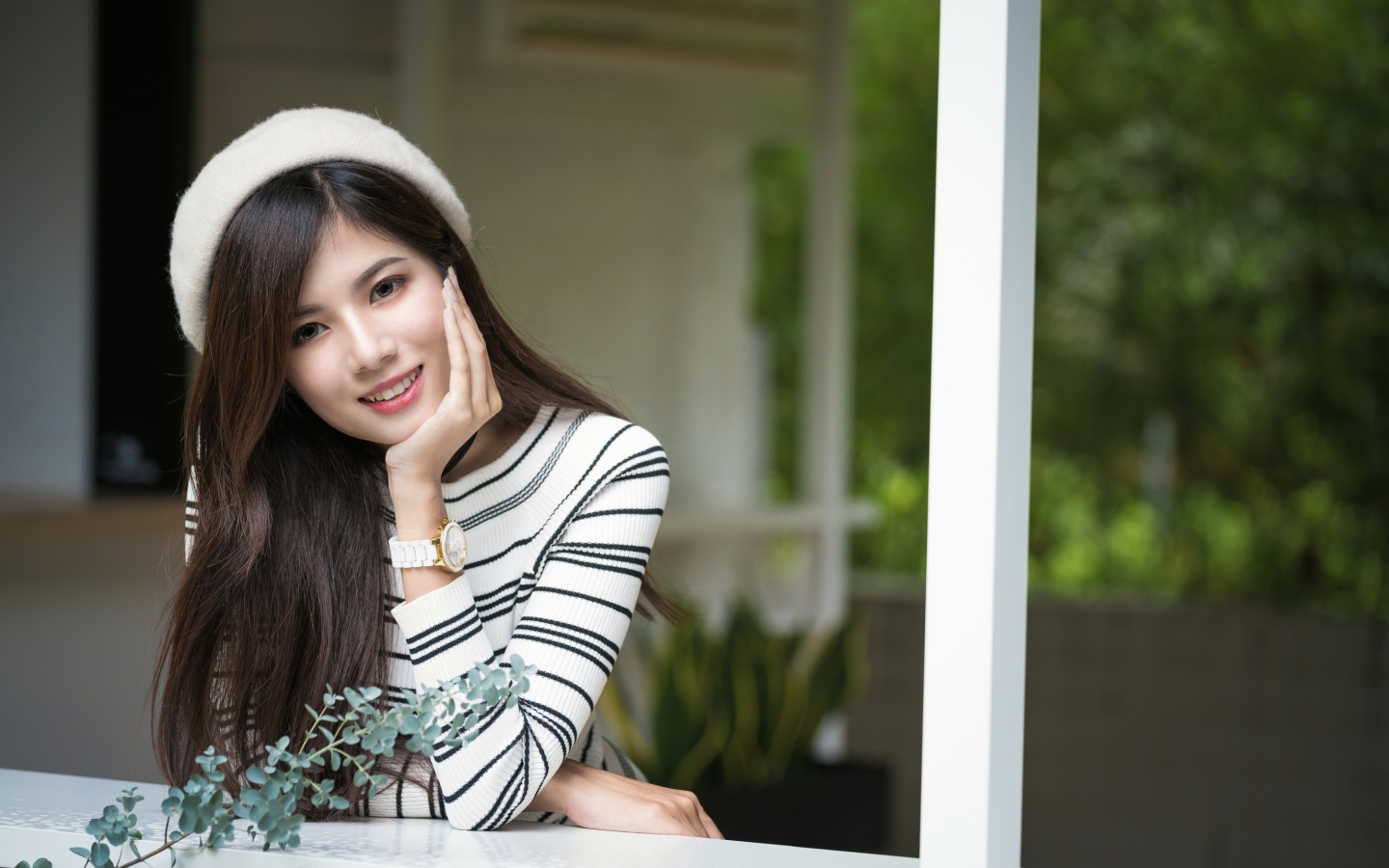 Beautiful asian girl in white beret