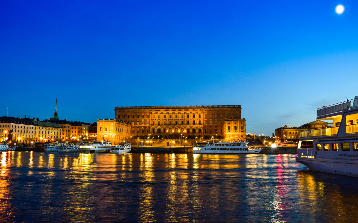 The palace is reflected in the water in the evening, Stockholm. Sweden