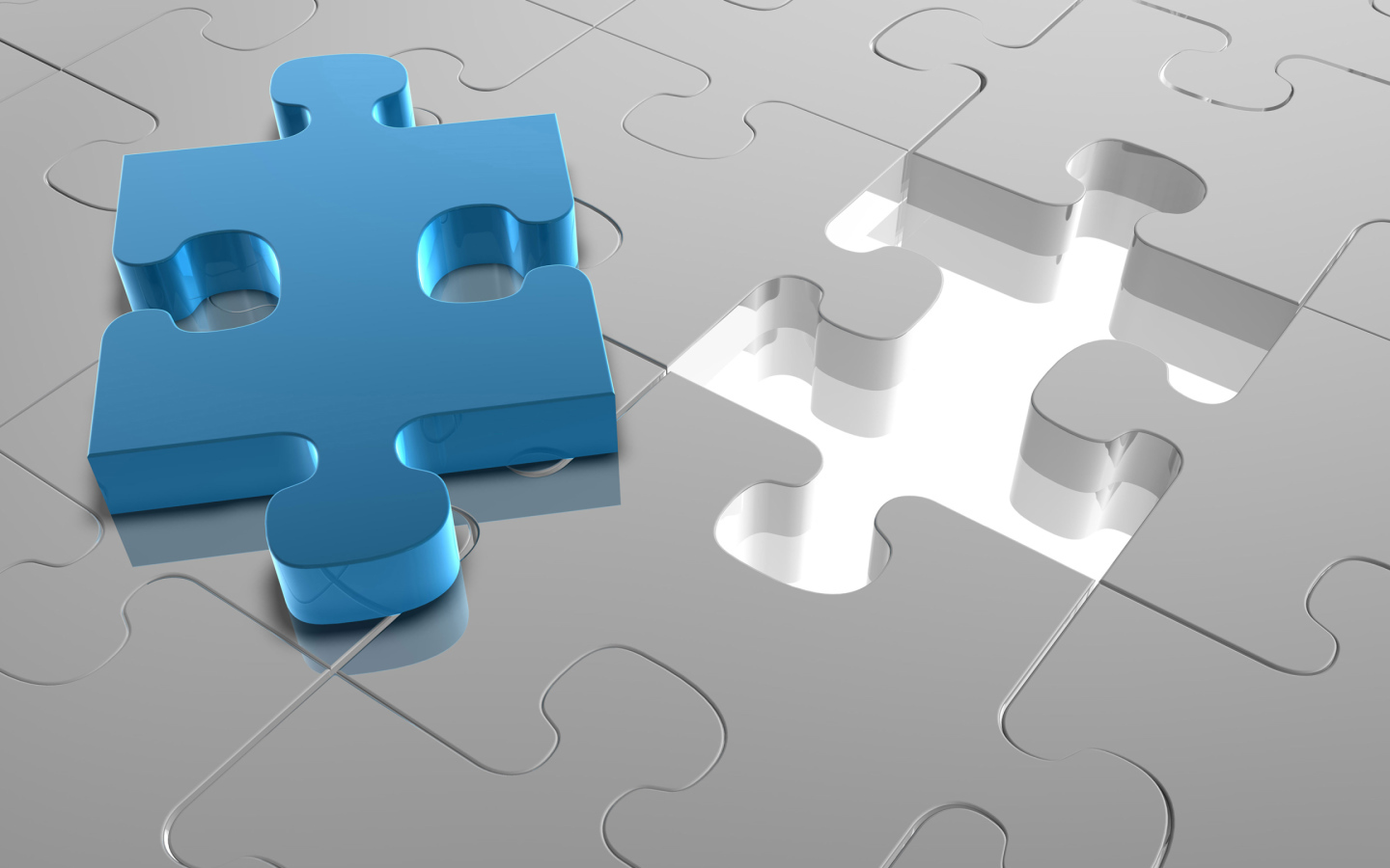 Голубой пазл на сером рисунке 