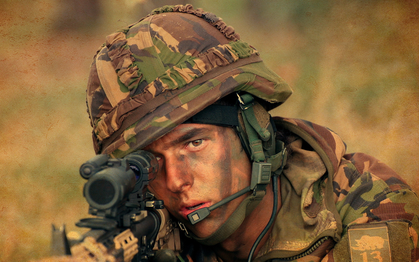 Male soldier in a helmet with a rifle