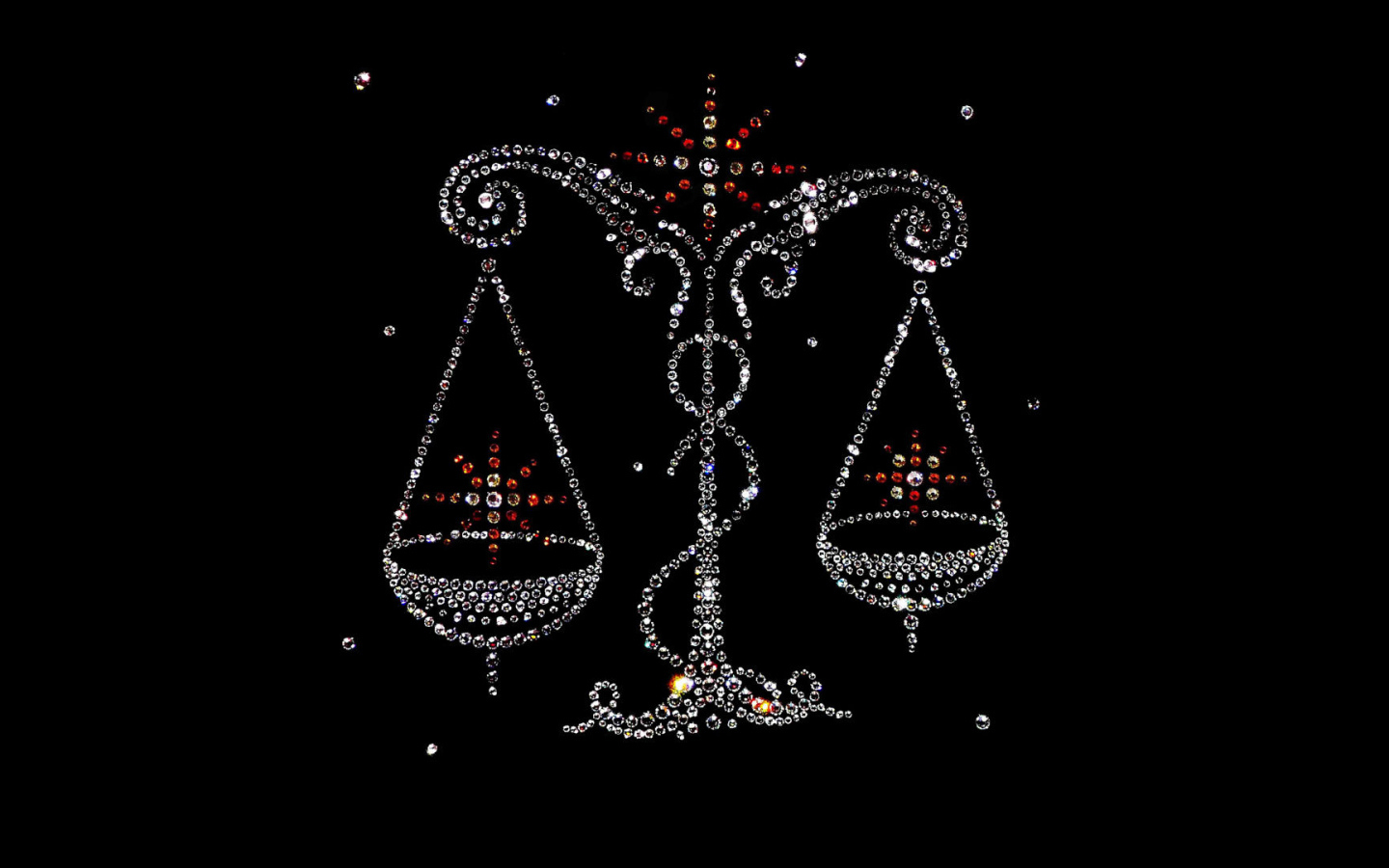 Блестящий знак зодиака весы на черном фоне