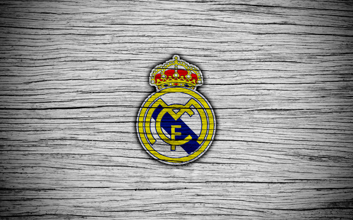 The logo of the football club Real Madrid on a gray background