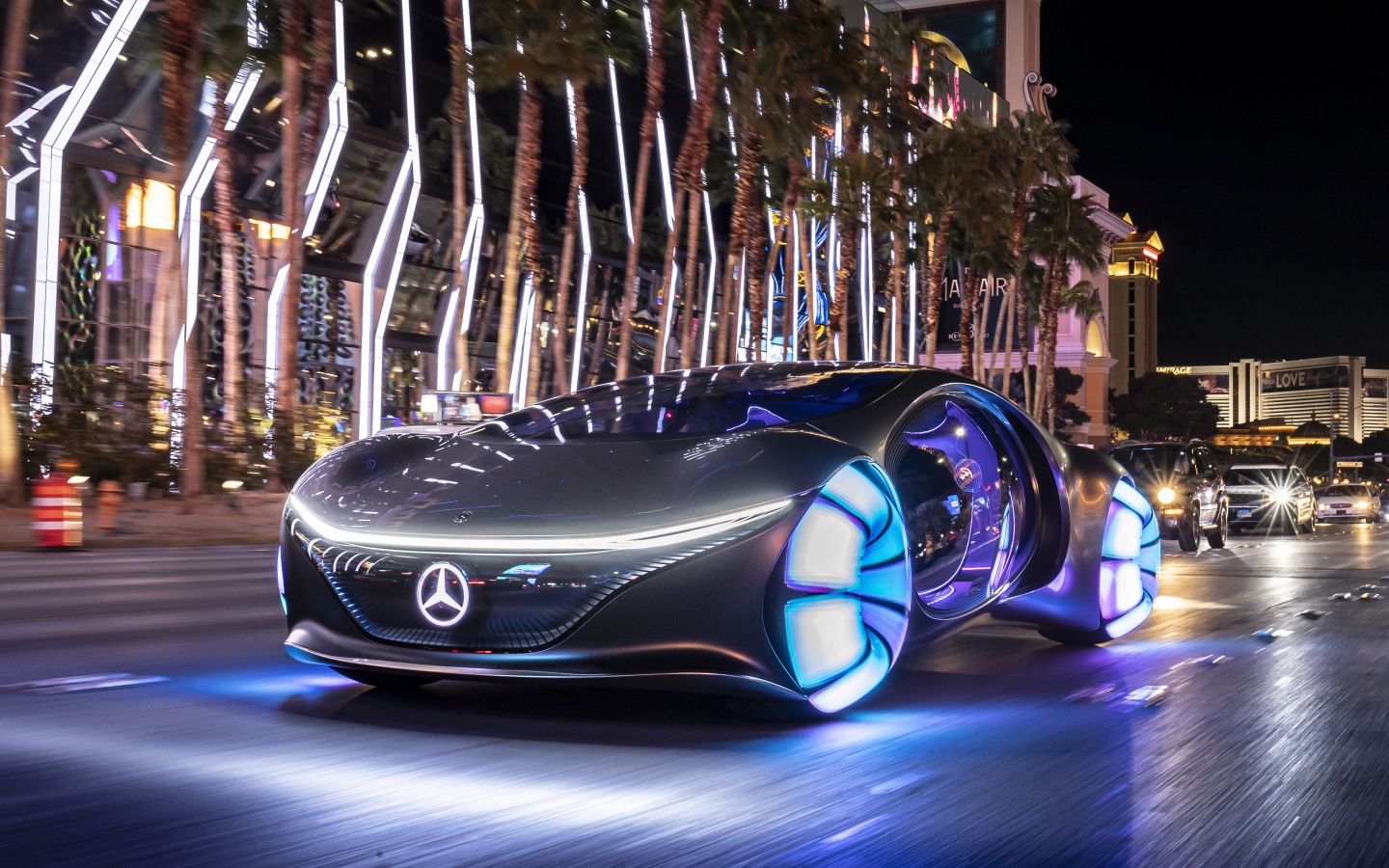 Автомобиль Mercedes-Benz VISION AVTR, 2020 года с неоновыми колесами на улице