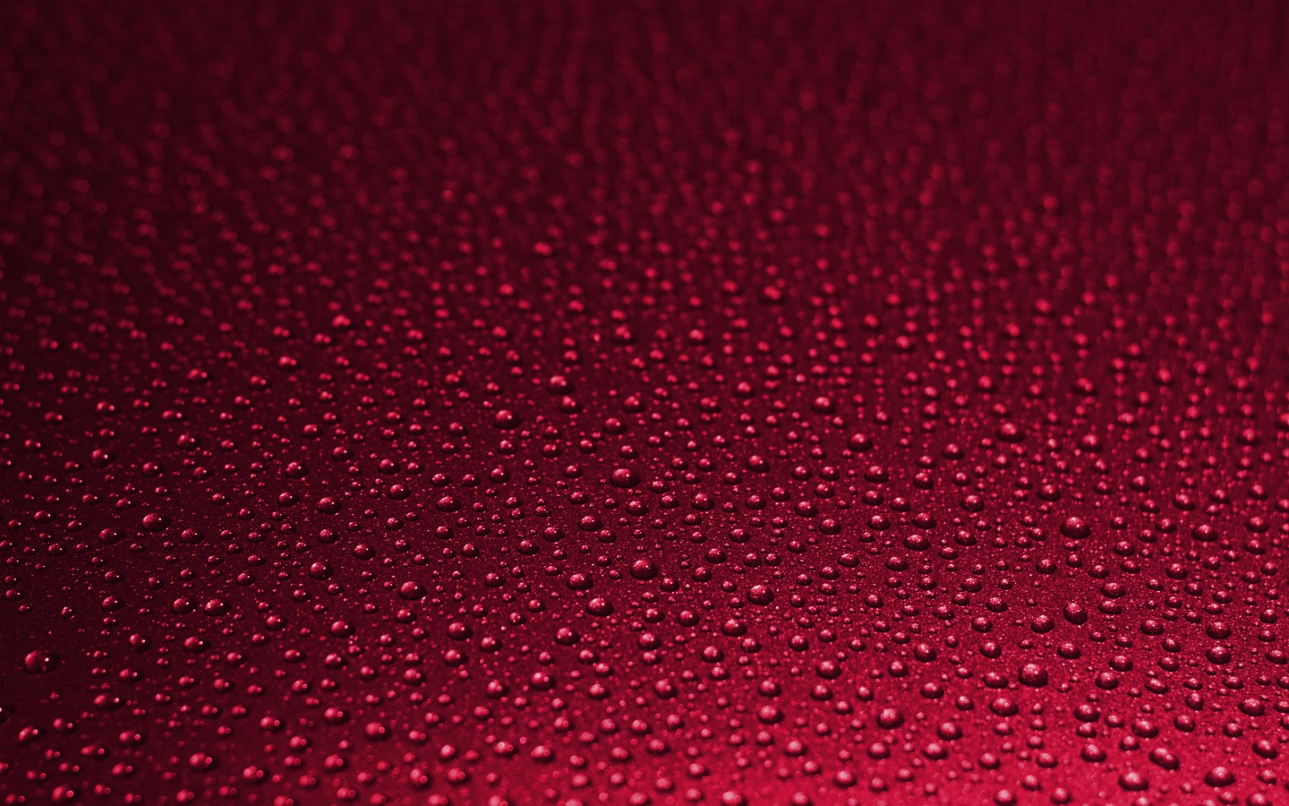 Красный фон с каплями воды 