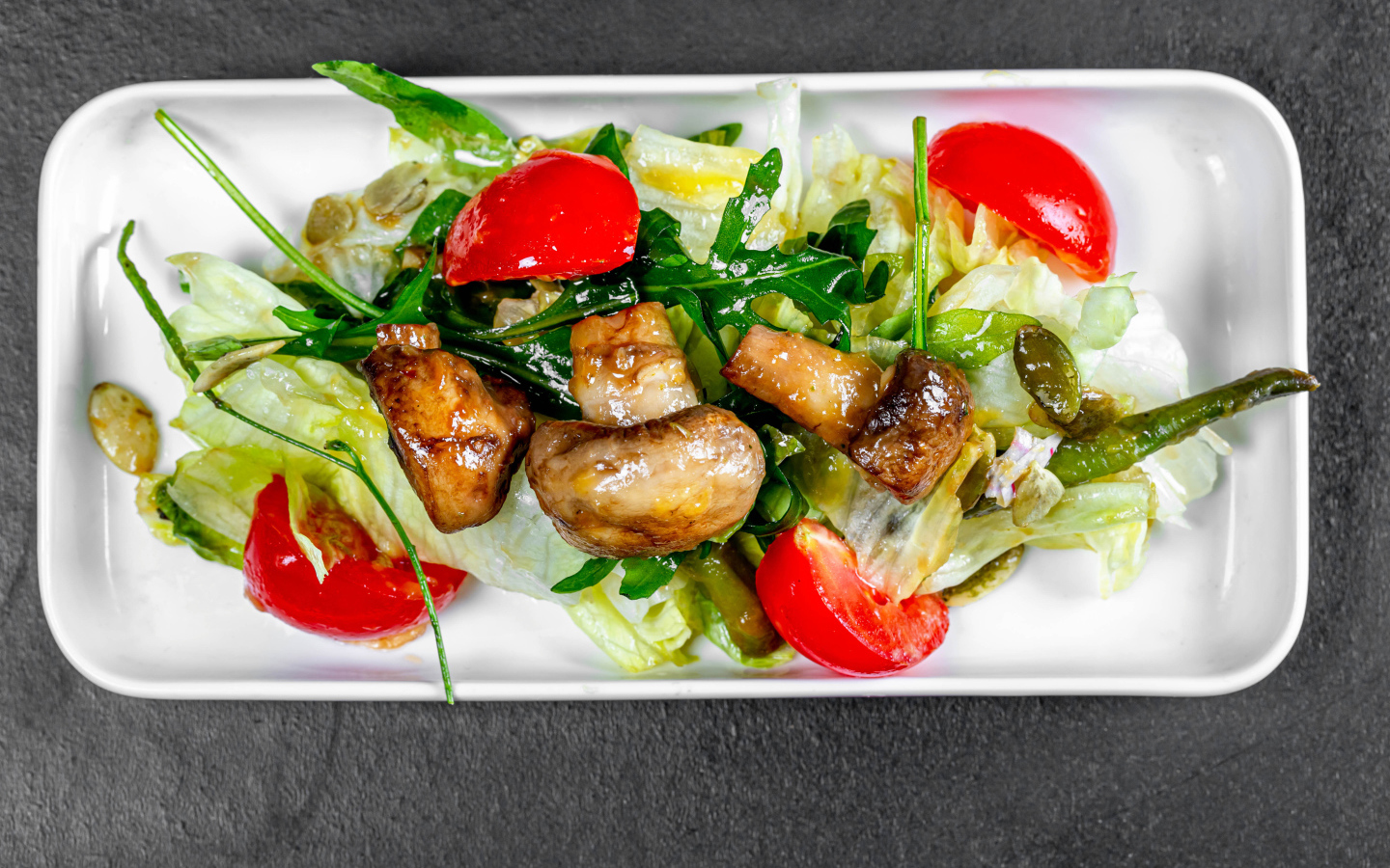 Salad with cabbage, fried mushrooms and tomatoes