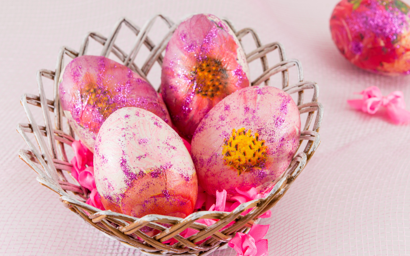 Beautiful pink eggs in a basket for Easter