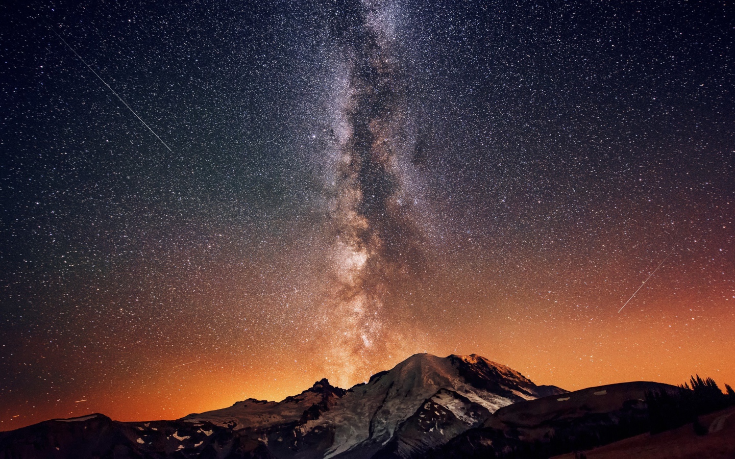 The milky way in the starry sky over the mountain