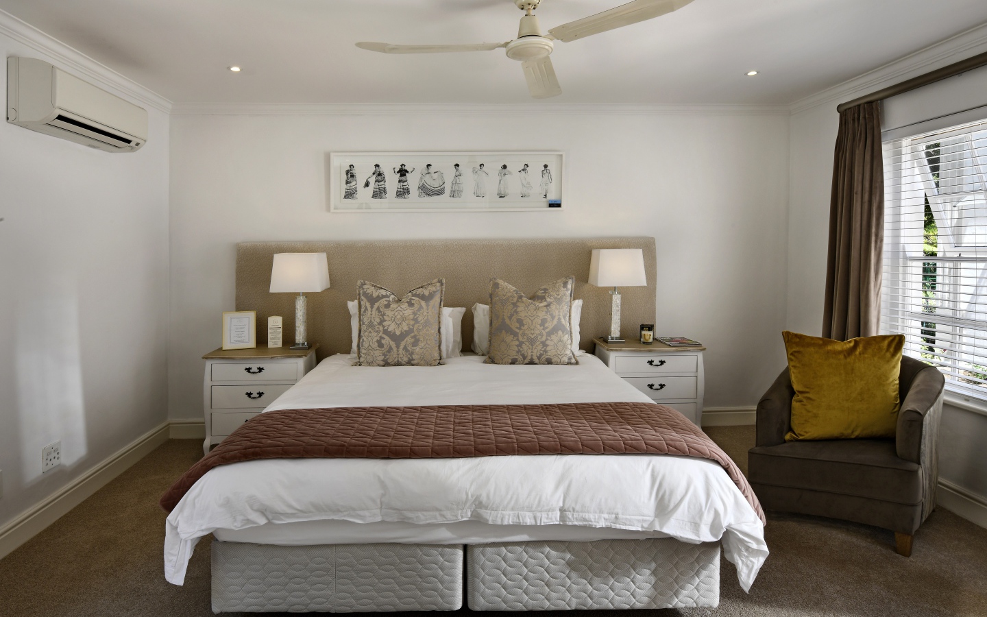 Large bed in the bedroom with fan