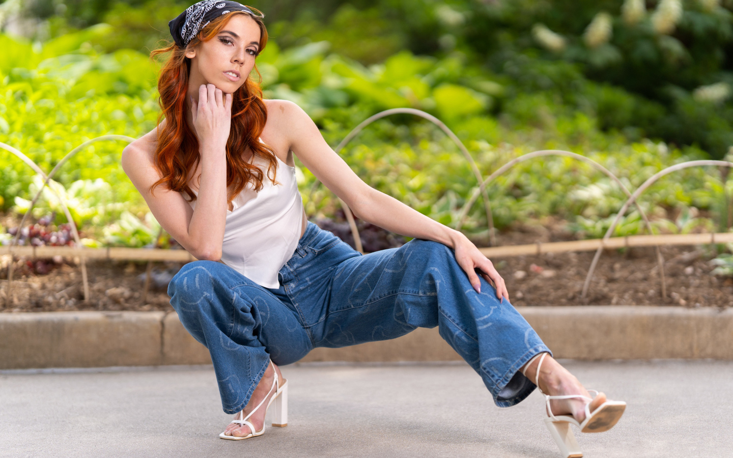 Red-haired girl in blue jeans