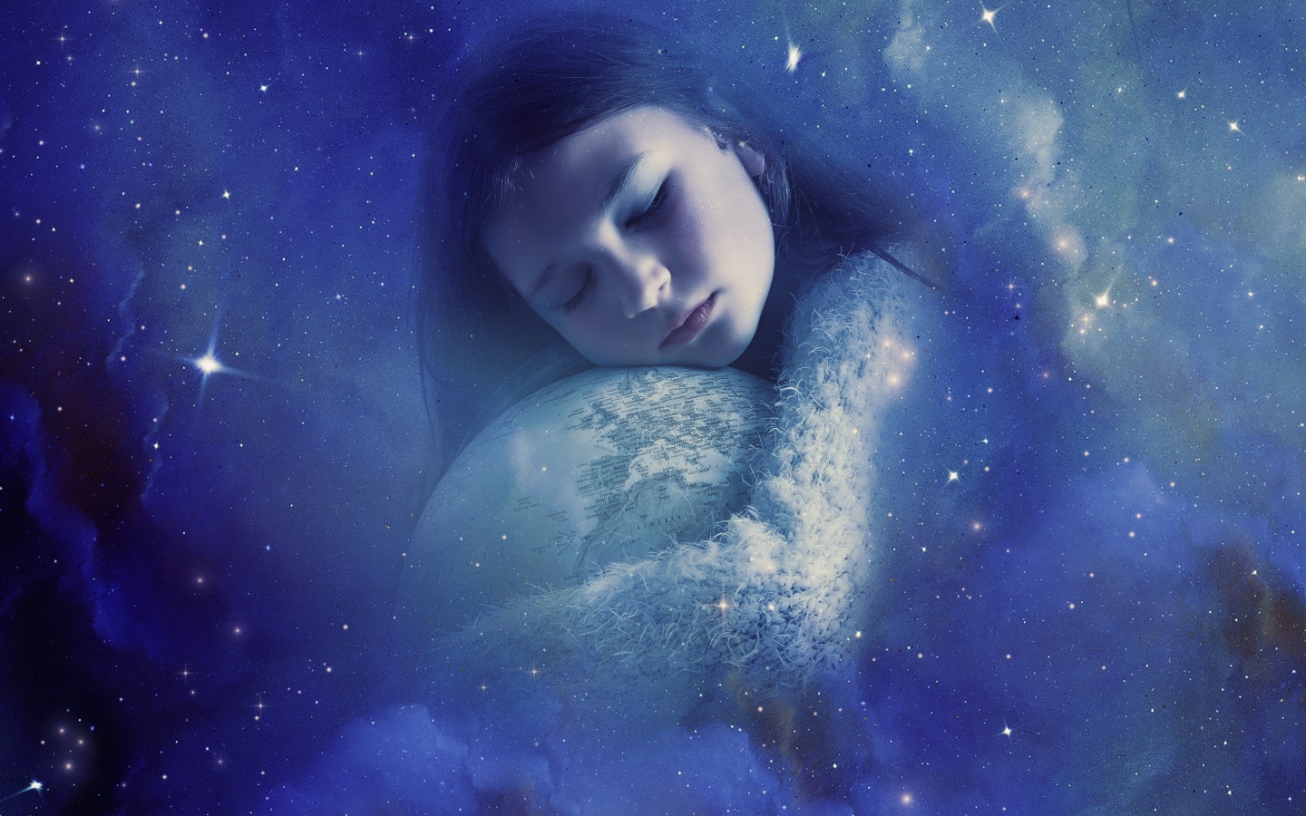 Little girl hugging a globe in a dream
