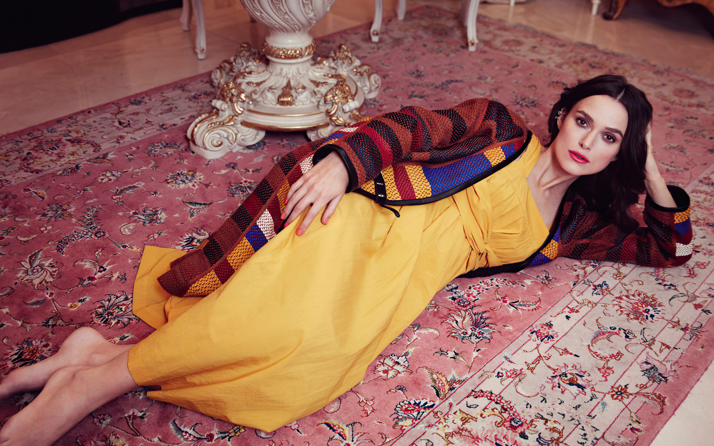 Actress Keira Knightley lies on the floor